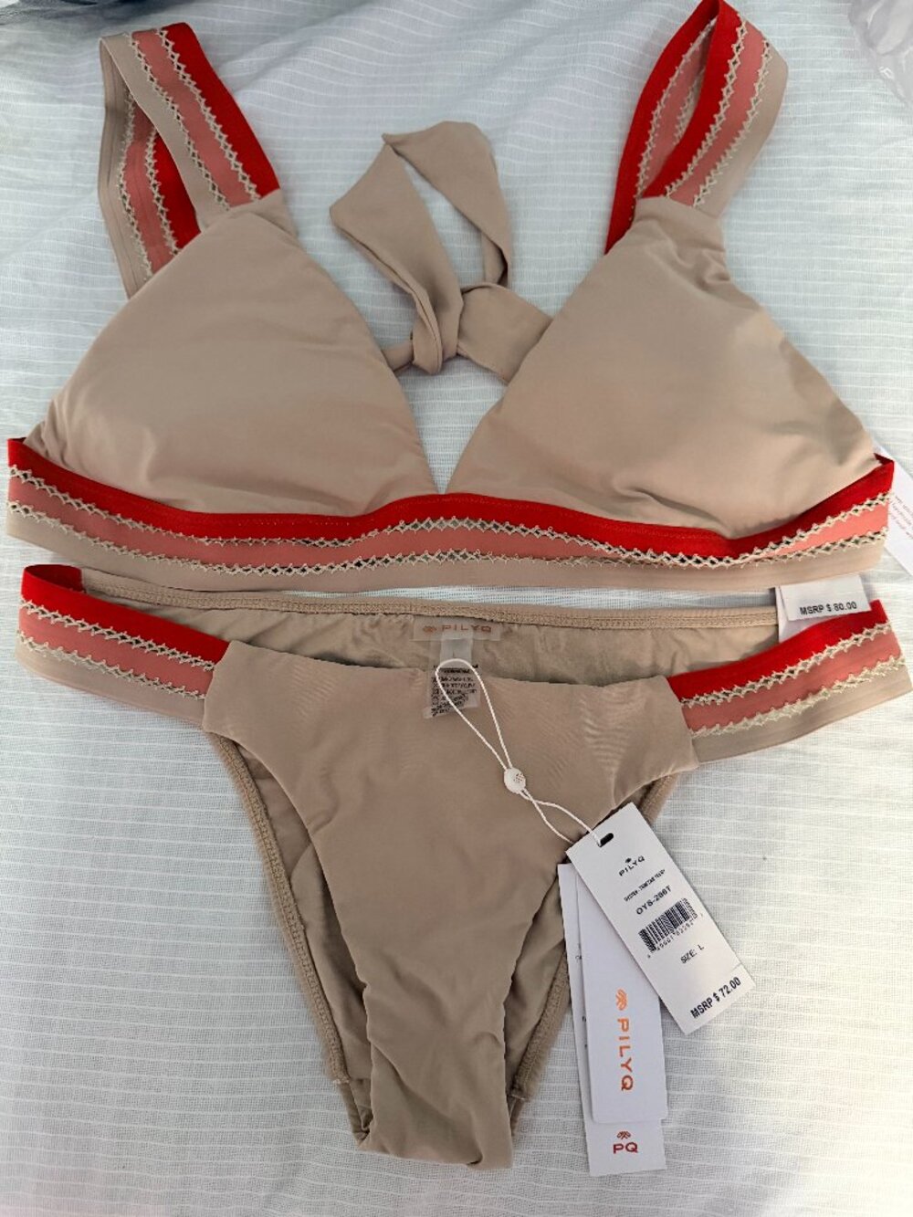 PQ swim bikini set ,new with tags. the top -size D and the bottom - size L